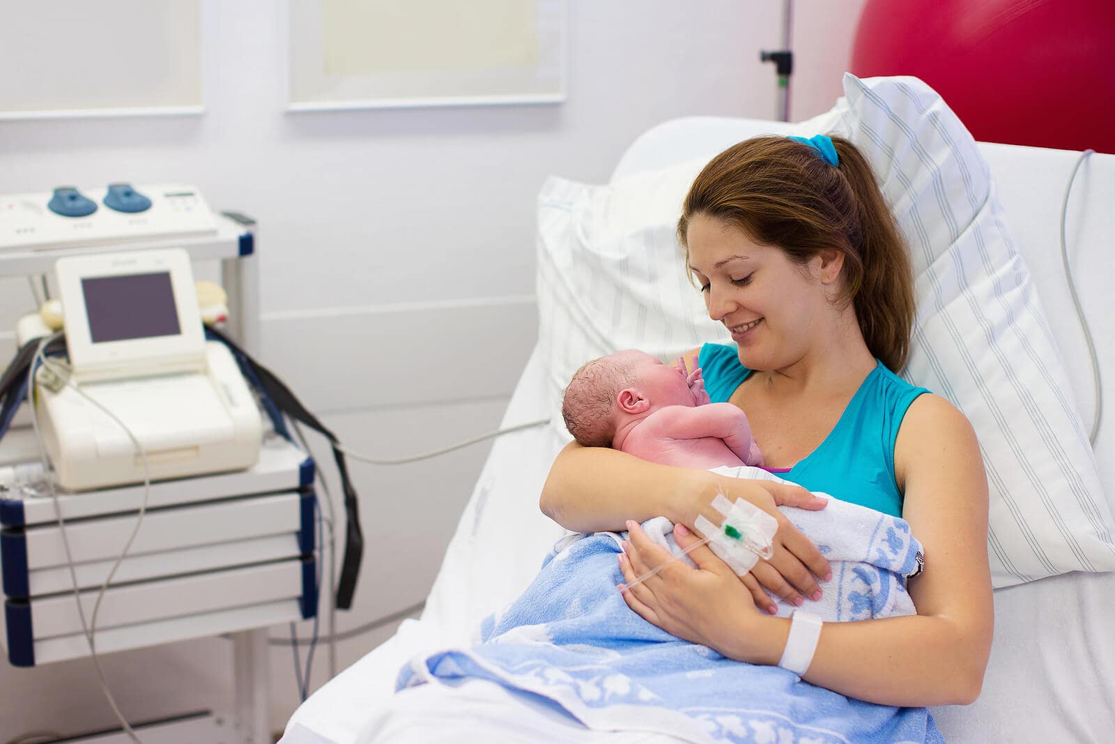 Mother giving birth to a baby